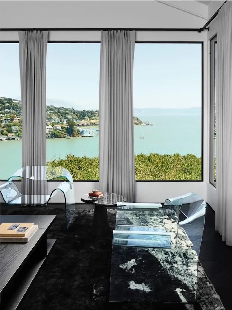 Living room with floor-to-ceiling bay views